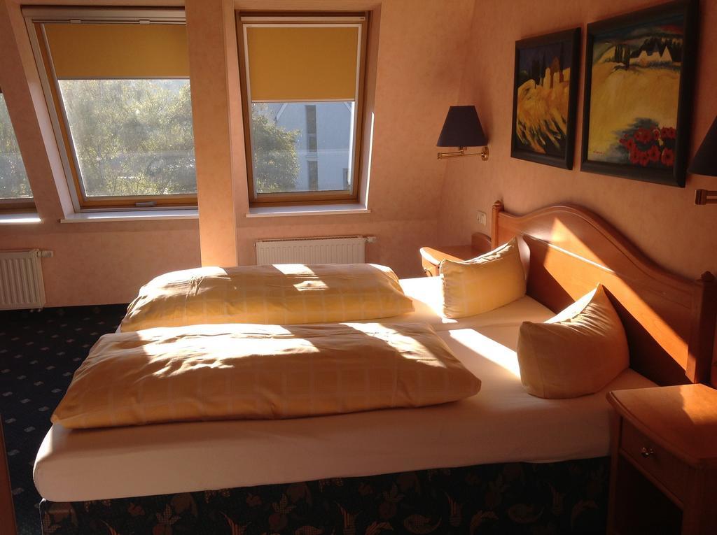 Duenenhotel Am Meer Rostock Quarto foto